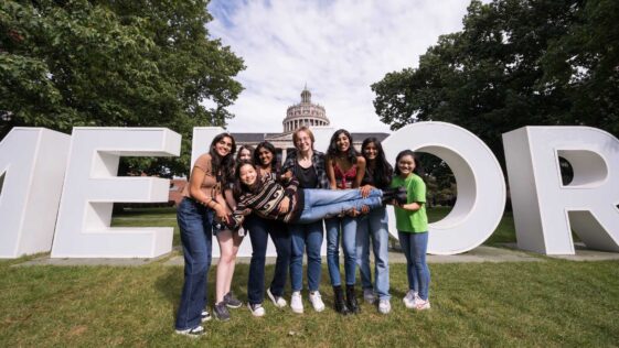 Boundless Festivities At Meliora Weekend 2023 News Center Six university of rochester students hold up a seventh in front of the giant letters on the quad during meliora weekend 2023.