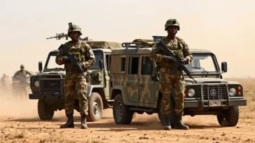 Military personnel and security vehicles stationed at a rural base in Bauchi State.