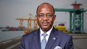 Governor lucky aiyedatiwa speaking at a podium during the ondo state investment summit.