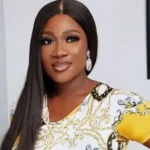 Portrait of actress mercy johnson-okojie regarding her edo state appointment.