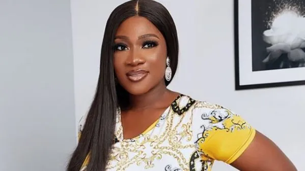 Portrait of actress mercy johnson-okojie regarding her edo state appointment.