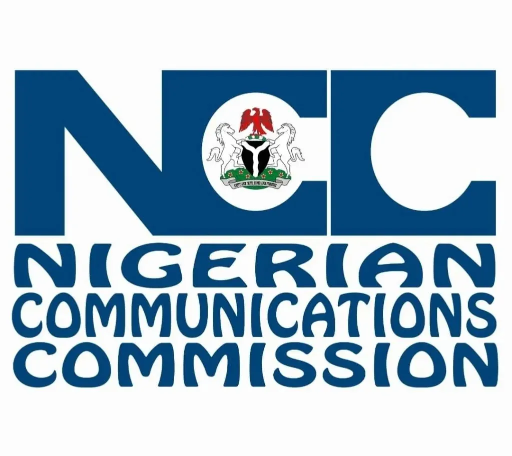 The official logo of the nigerian communications commission on a building.